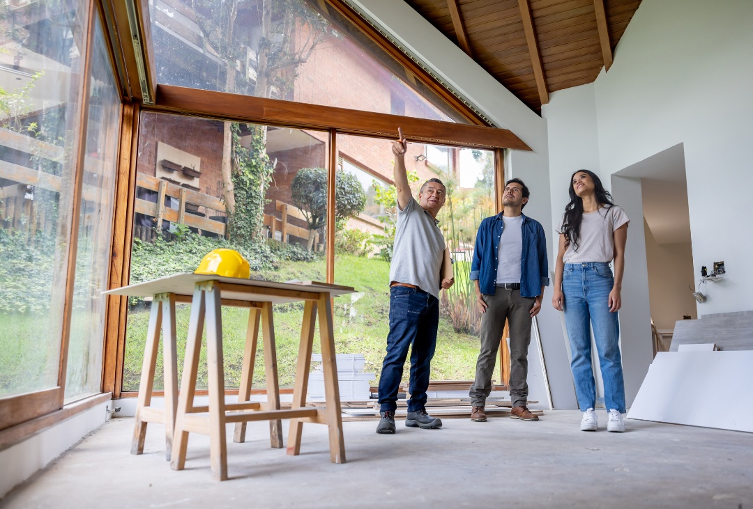 Building contractor talking to clients