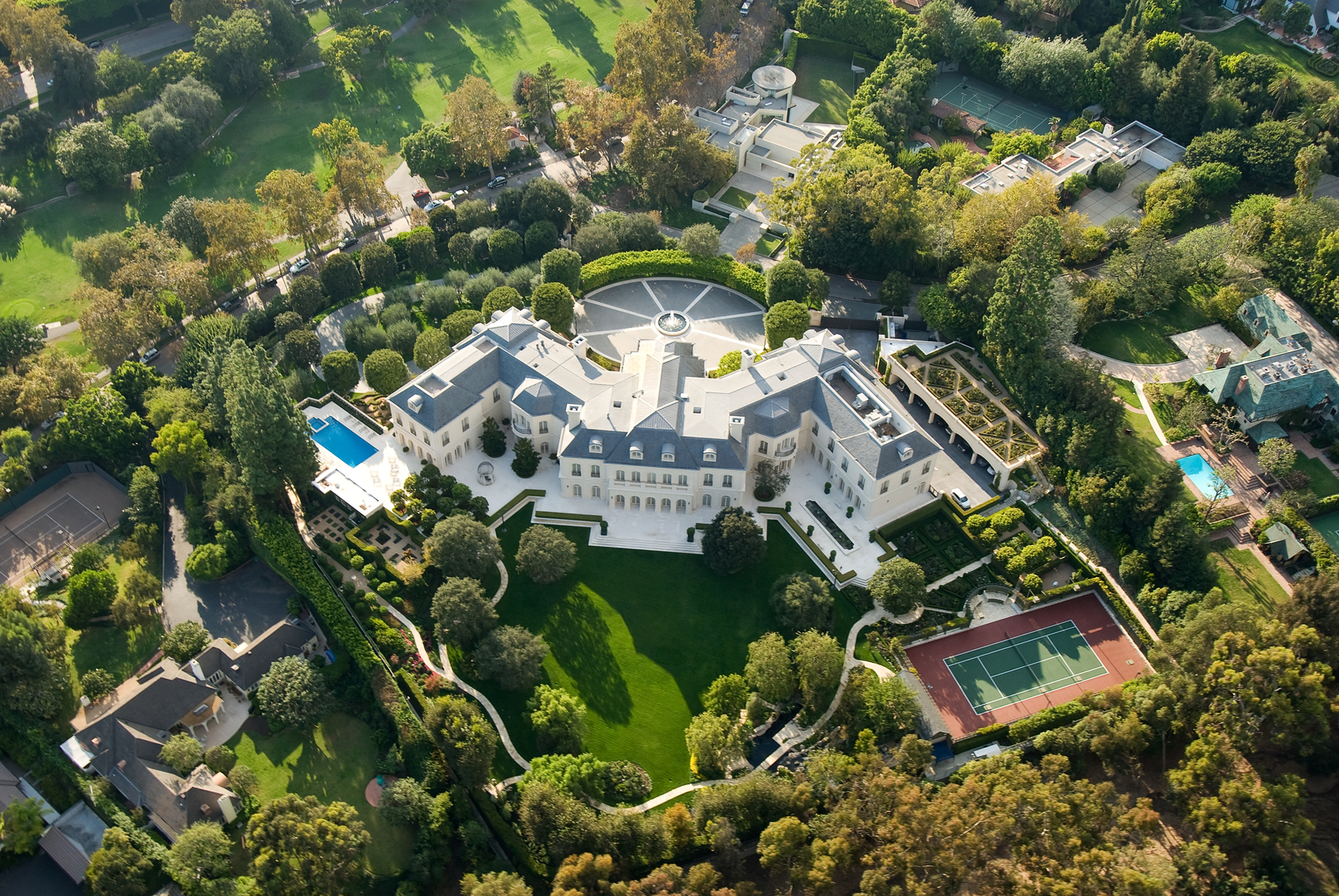 Los Angeles, California, USA - October 13, 2007: Large mansion in the exclusive area of Holmby Hills in Los Angeles. The mansion was built in 1991 by the late TV producer Aaron Spelling. The house was placed on the market by his widow, Candy Spelling, in 2009 for $150 million. In 2011, the house was sold for $85 million to Petra Ecclestone, daughter of Formula One billionaire Bernie Ecclestone.