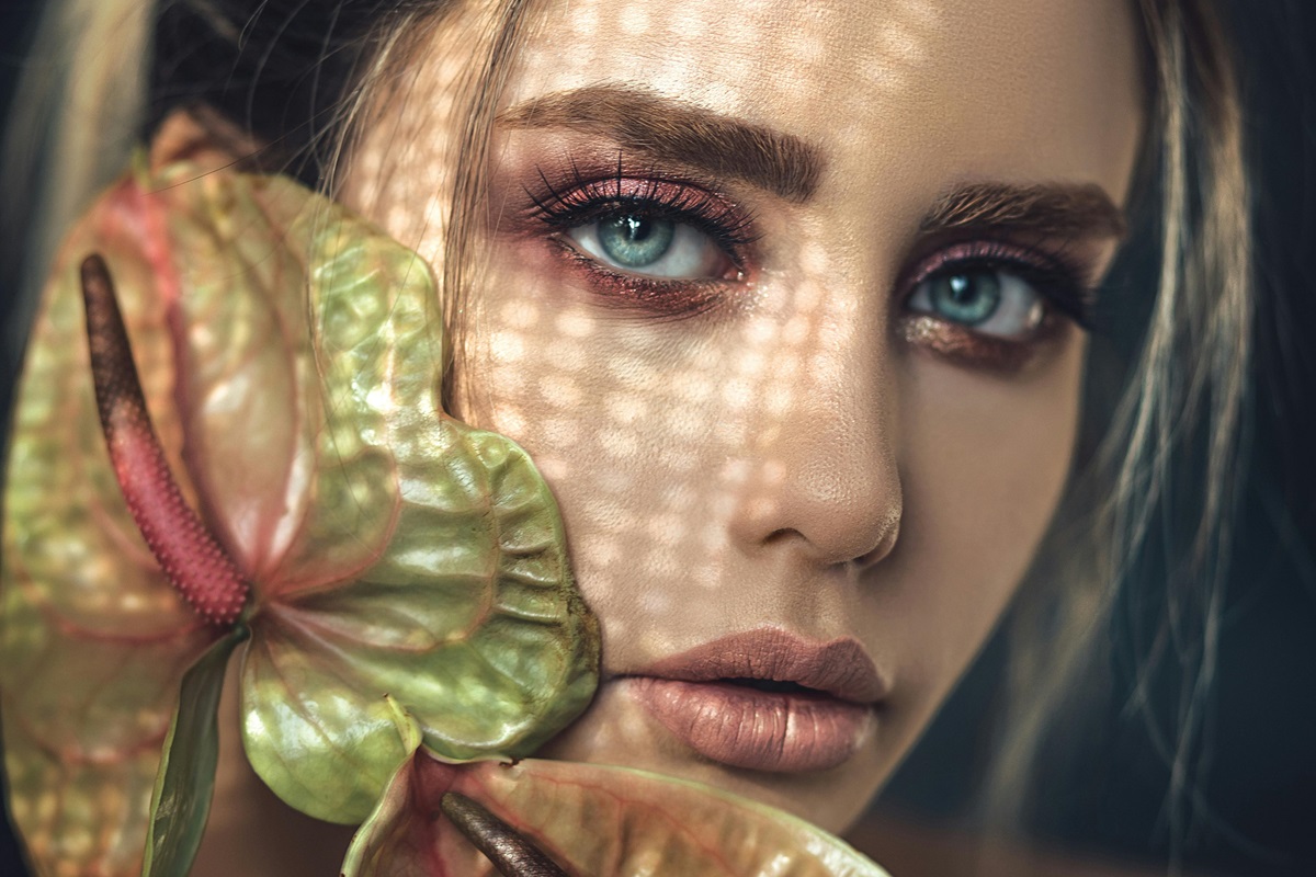 A fashion model with blue eyes.