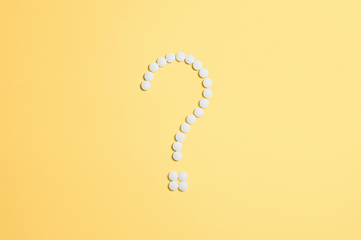 A question mark with a yellow background.
