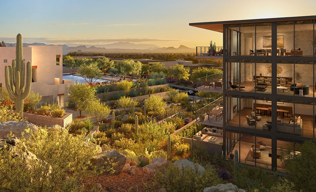 Luxury Ascent condos with expansive glass windows and scenic desert landscaping, overlooking the valley at sunset.