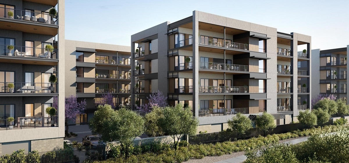 A rendering of Portico's modern condo development featuring multiple levels, spacious balconies, and lush surrounding greenery.