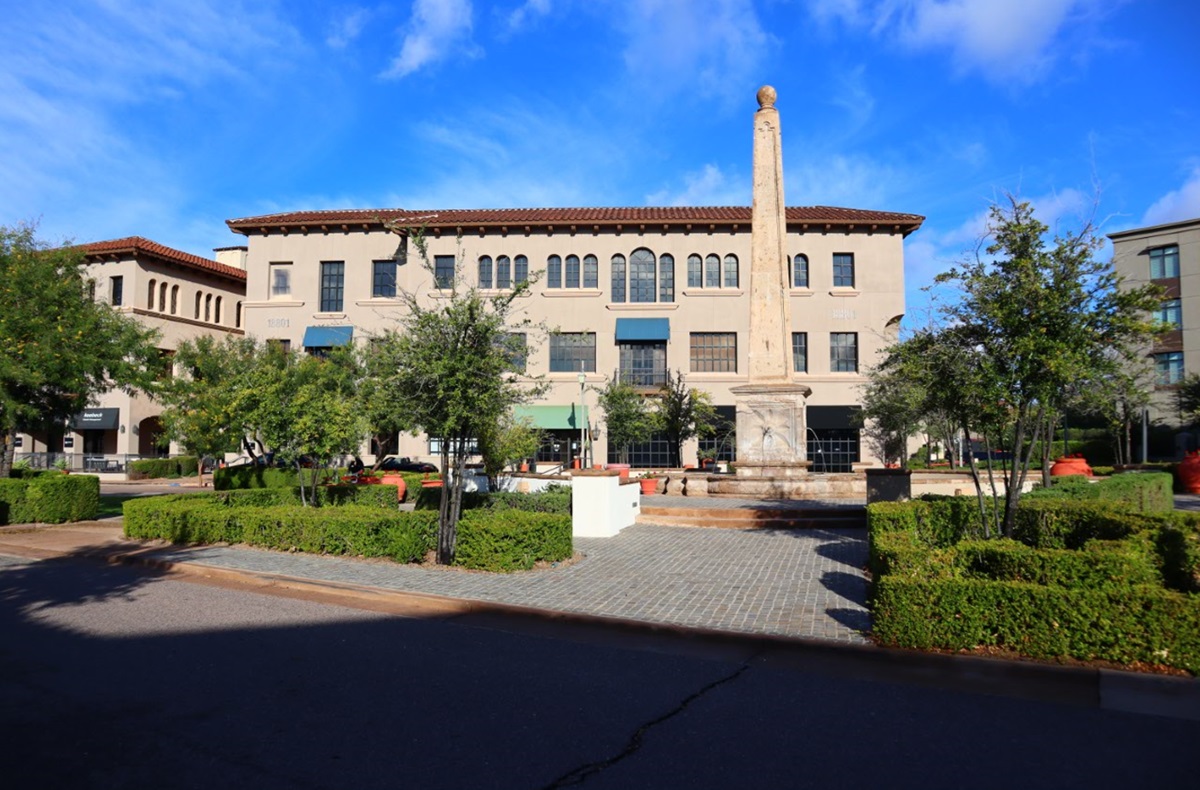 European-inspired buildings and obelisk monument at Market Street in DC Ranch near Silverleaf.