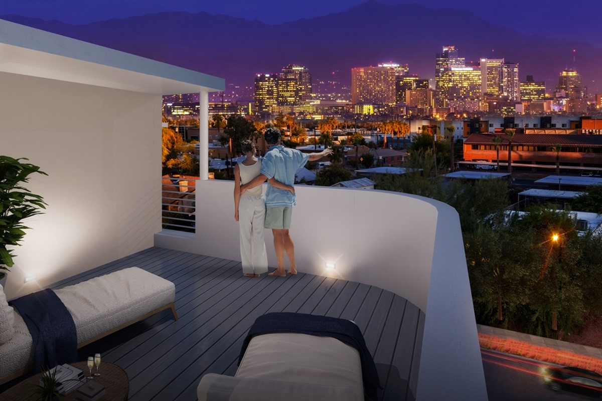 Couple enjoying city views from a rooftop terrace at Soleil, Phoenix.