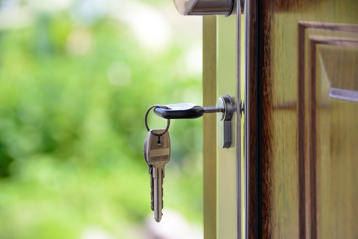 Keys in the door of a house.