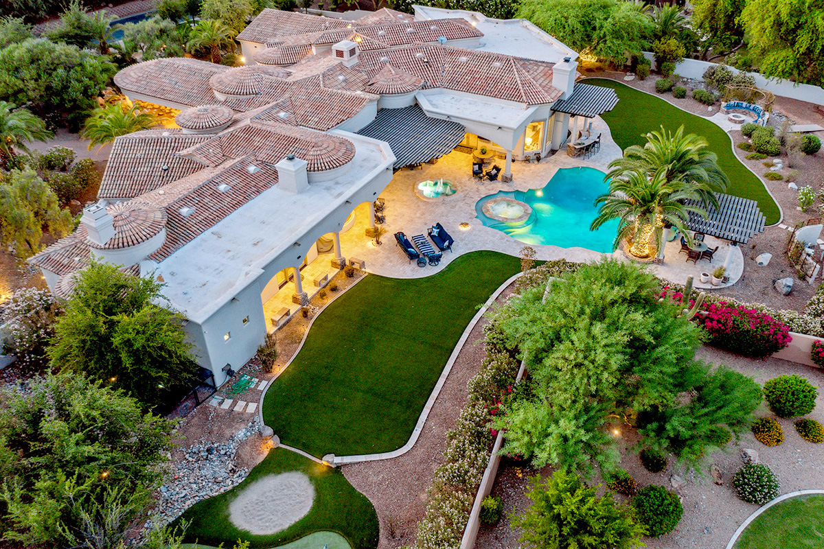 A luxury home with a pool.