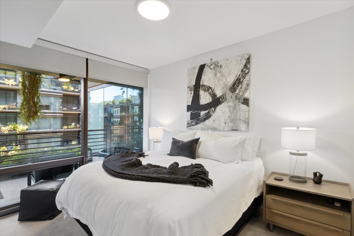 Bedroom of a unit at Optima Kierland.