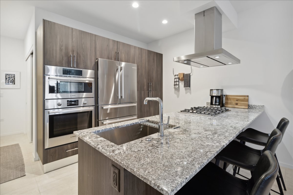 The kitchen of a condo unit at Optima Kierland.