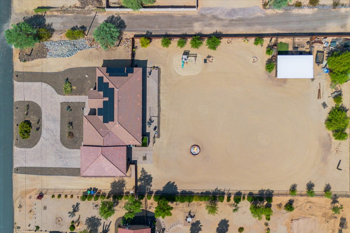 A home in Desert Hills on an acre of land seen from high above drone shot.