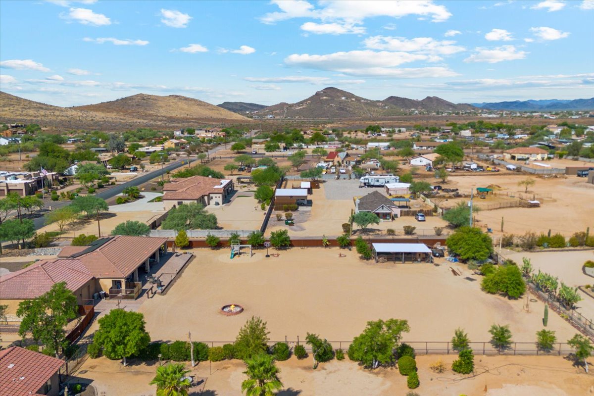 A home in Desert Hills on an acre of land seen from high above drone shot.