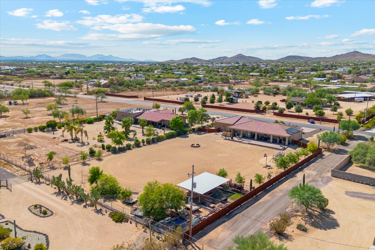 A home in Desert Hills on an acre of land seen from high above drone shot.