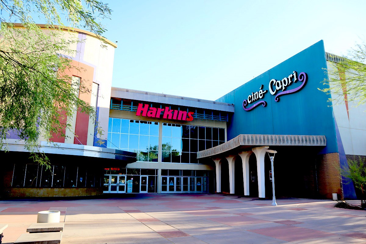 Harkins Cine Capri movie theater in Scottsdale with a modern facade, reflecting the city’s vibrant entertainment scene under a clear sky.