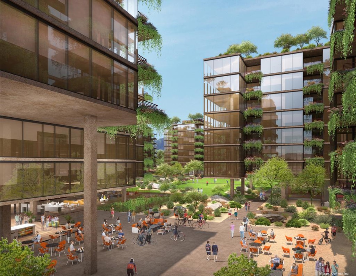 An architectural rendering of Optima McDowell Mountain Village’s outdoor dining area, with glass-walled buildings featuring greenery-covered balconies. Visitors gather at tables and walk around a plaza surrounded by landscaped gardens and desert plants.
