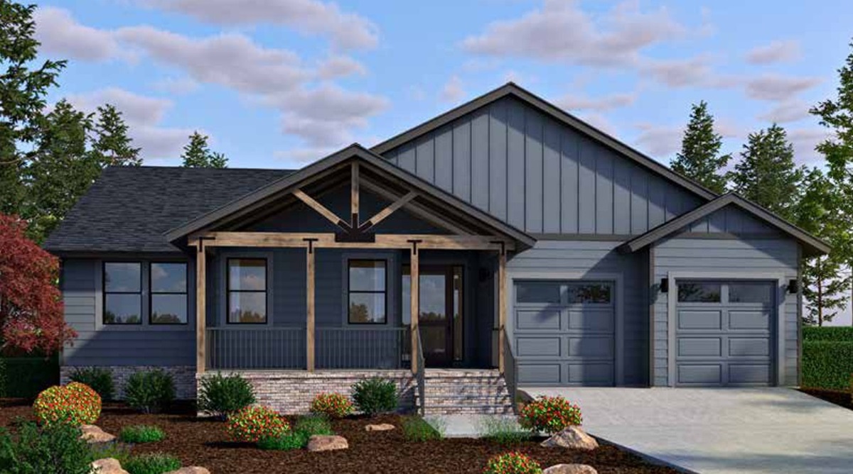 A single-story home with dark blue-gray siding and a two-car garage, set against a backdrop of trees, located at The Highlands at Tovar Springs.