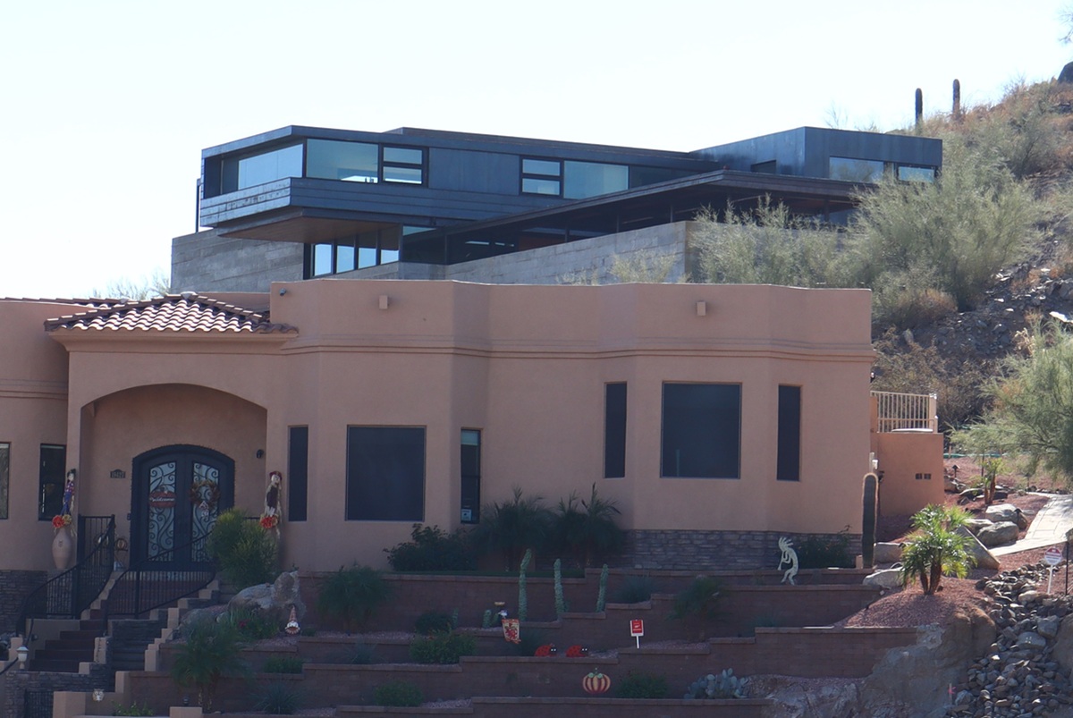 Contemporary and traditional homes nestled in the Paradise Valley desert landscape.