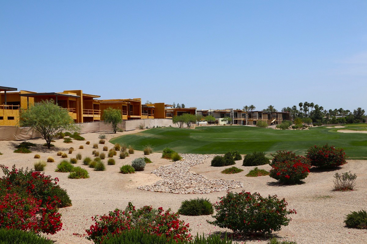 A golf course fairway in Arizona with new homes being built.