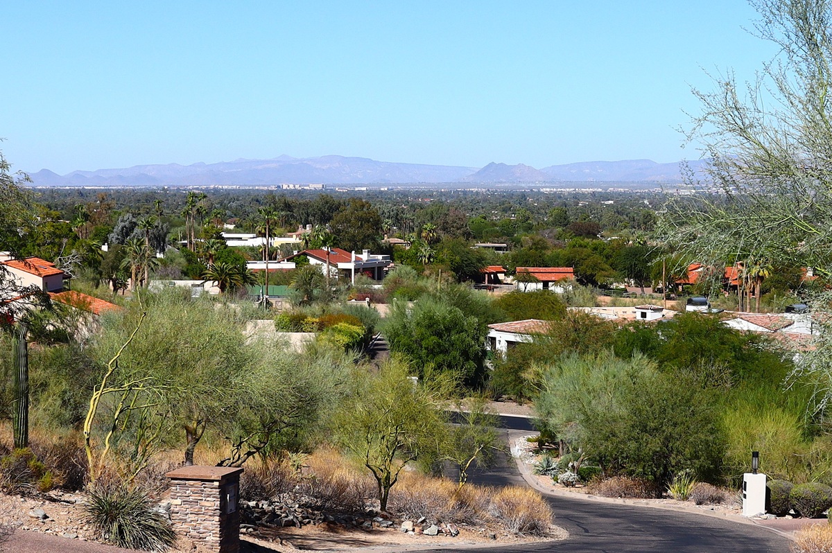 A Greater Phoenix neighborhood with desert plants, homes, and mountain views.