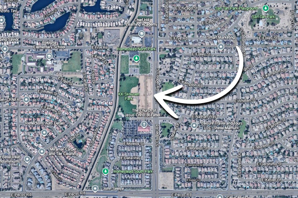 Aerial map showing the location of Parkside Villas in Chandler, Arizona, with a white arrow pointing to the community near local parks, schools, and major roads.