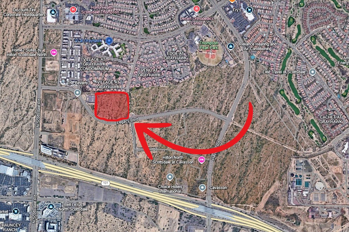 Map showing a 20-acre parcel near Legacy Boulevard and Miller Road in Scottsdale, with a red outline and arrow pointing to its location, surrounded by major developments like Cavasson and Loop 101.