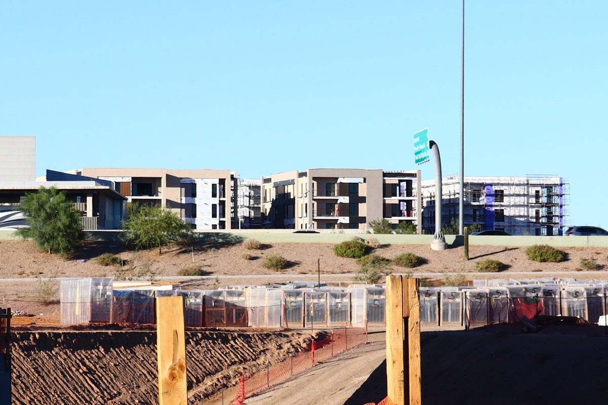 Portico building progress visible from Scottsdale Road near the Loop 101 Corridor.