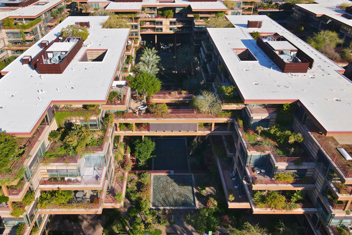 A drone photo of Optima Camelview Village in Old Town Scottsdale on a sunny day.