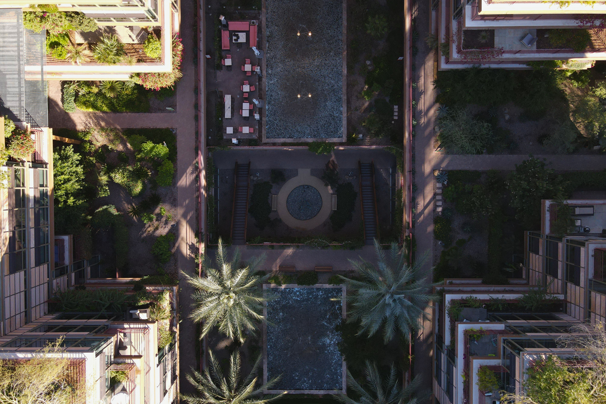 A drone photo of Optima Camelview Village in Old Town Scottsdale on a sunny day.