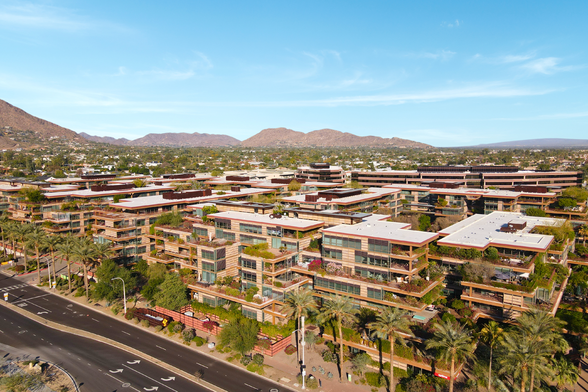A drone photo of Optima Camelview Village in Old Town Scottsdale on a sunny day.