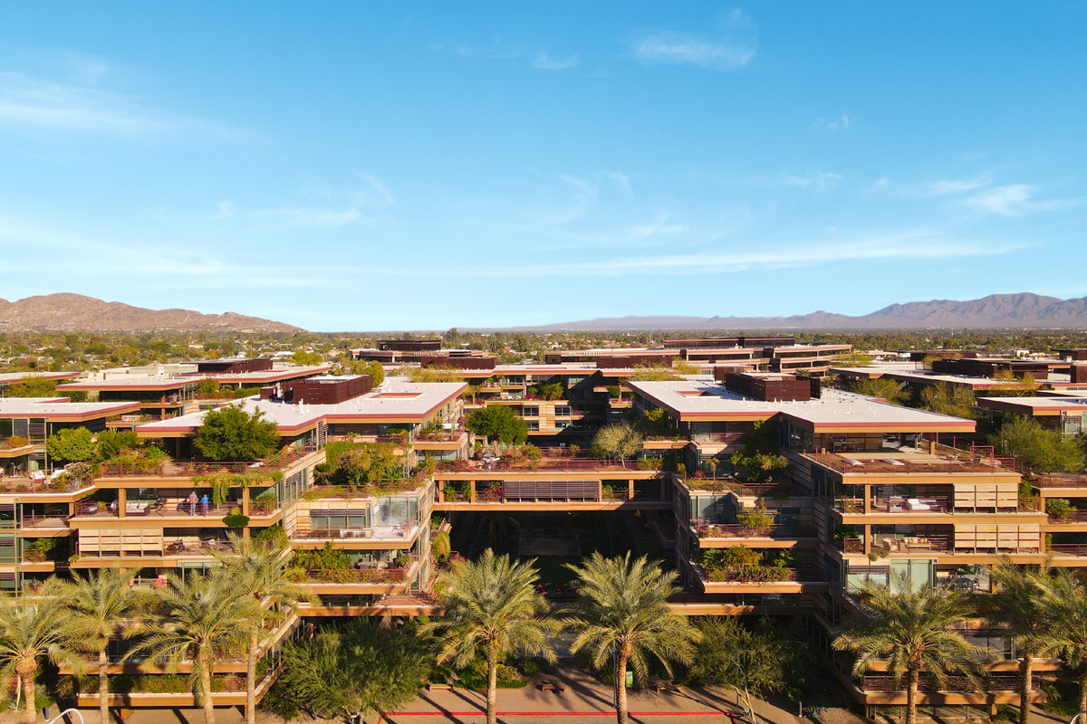 A drone photo of Optima Camelview Village in Old Town Scottsdale on a sunny day.
