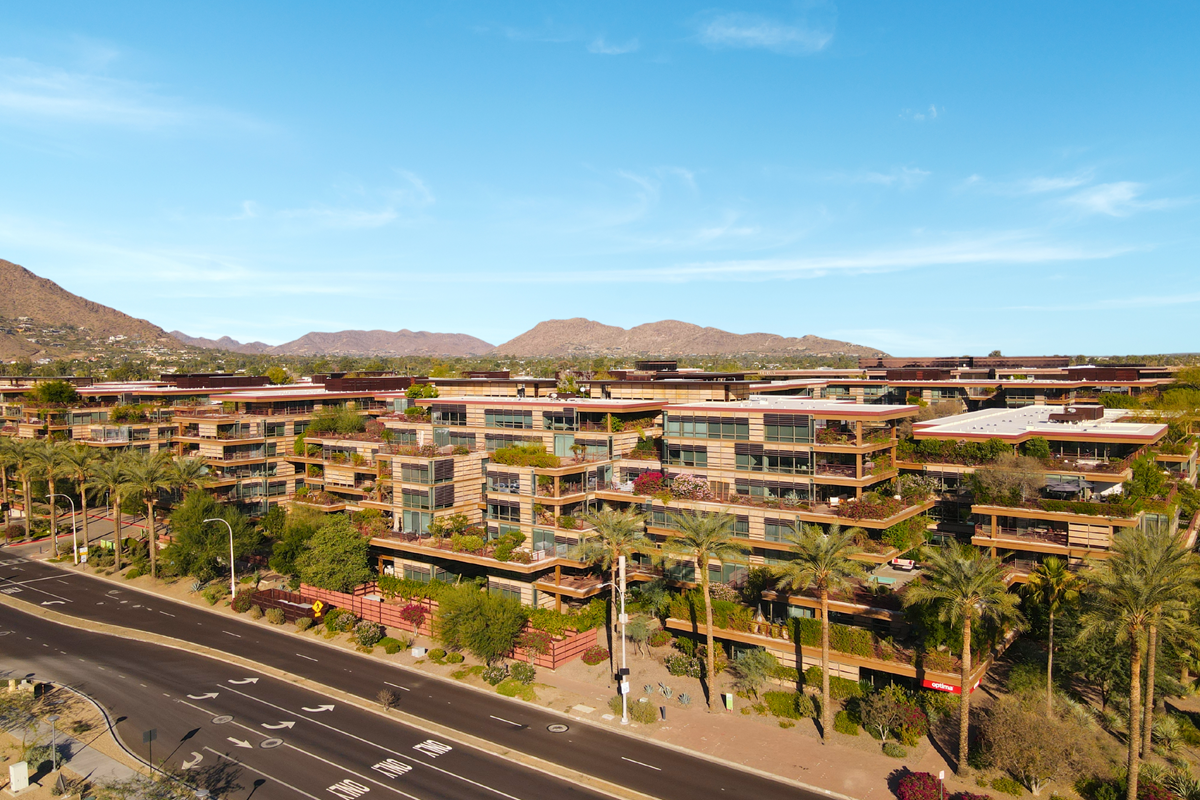 A drone photo of Optima Camelview Village in Old Town Scottsdale on a sunny day.