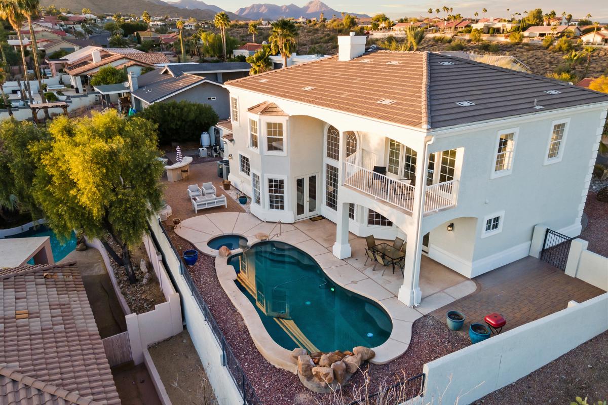 A drone shot of a luxury home and neighborhood in Fountain Hills.