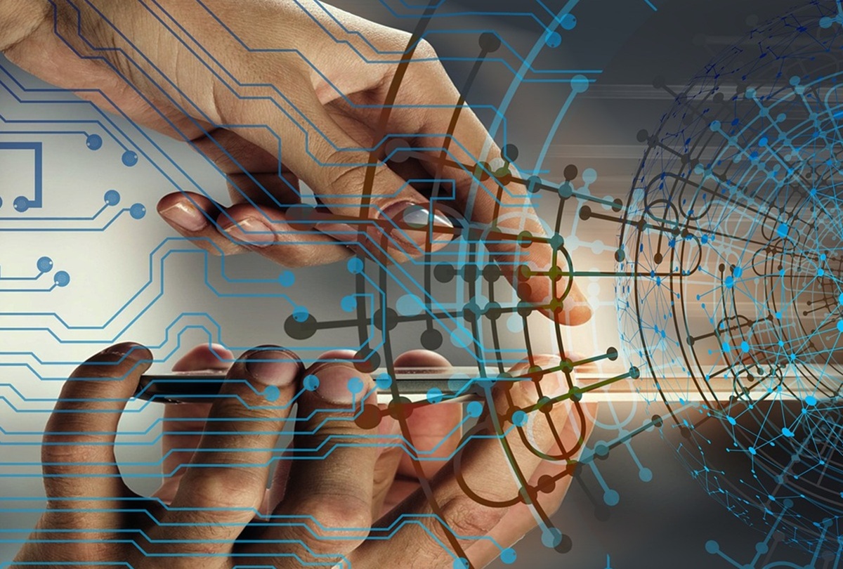 Hands interacting with digital circuits and a networked globe.