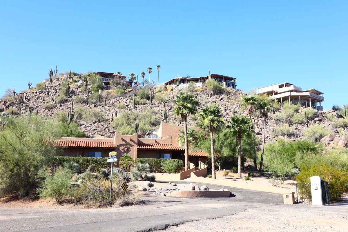 Luxury homes set along a rocky hillside in Paradise Valley, Arizona.