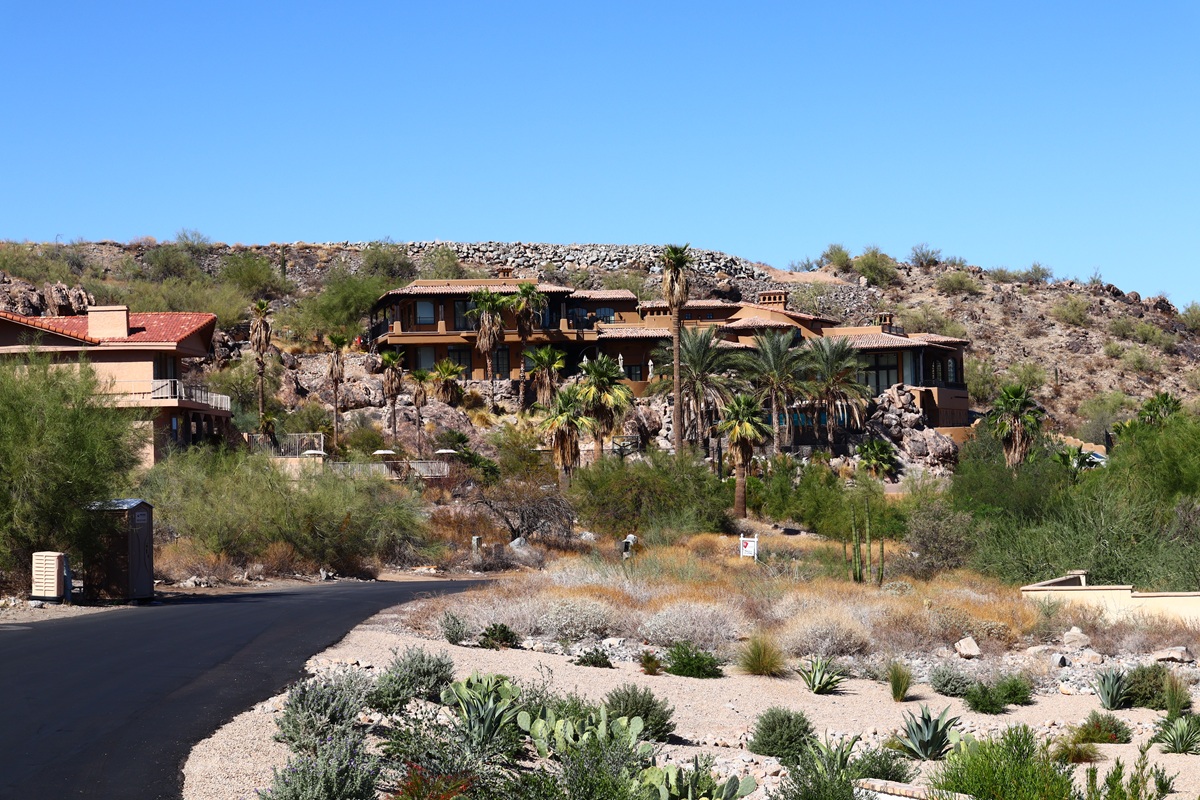 Large estate home with desert landscaping nestled in the hills of Paradise Valley.