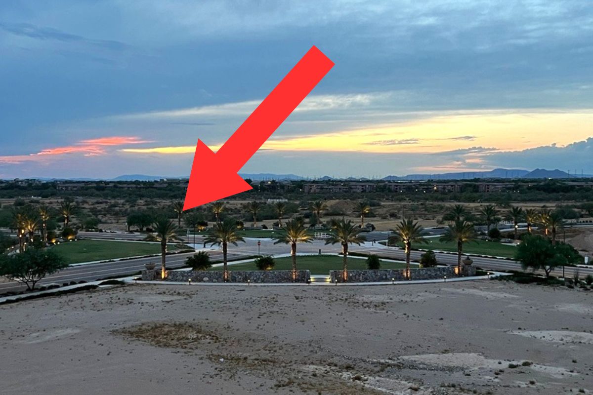 Photo with a red arrow pointing to where Toll at Cavasson will be built.