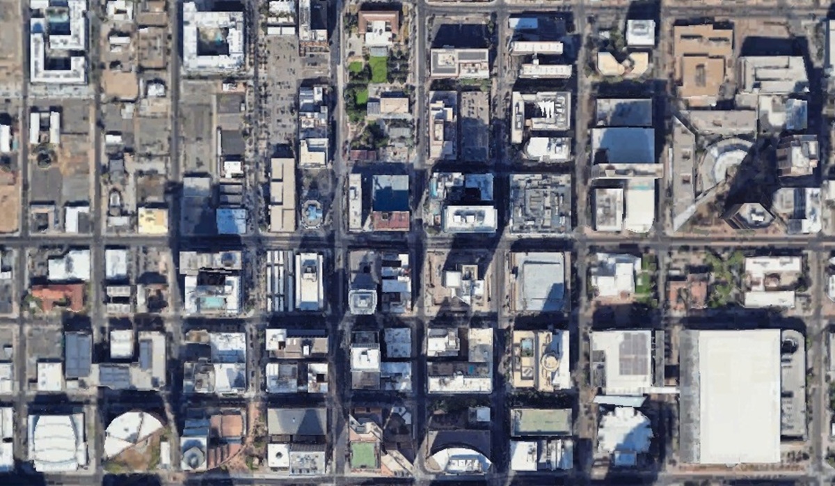 Top-down satellite view of downtown Phoenix showing city blocks, streets, and high-rise buildings.