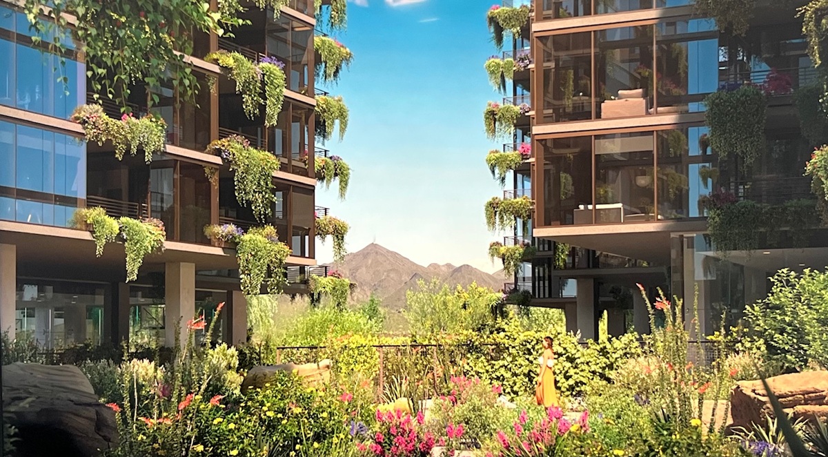 Optima McDowell Mountain condos with green balconies and desert backdrop.