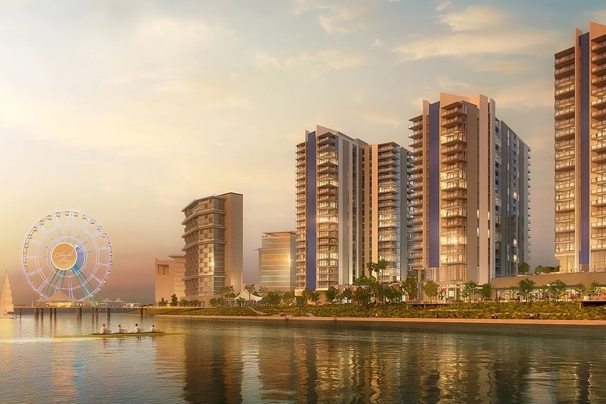 South Pier rendering of waterfront towers and a Ferris wheel at sunset.