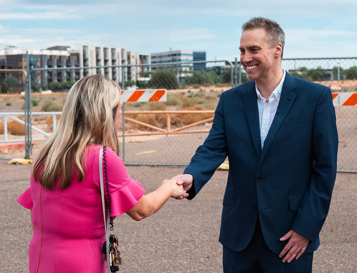 Aaron Auxier and Anne Ryman shaking hands after filming ABC 15 News Now - June 2026.