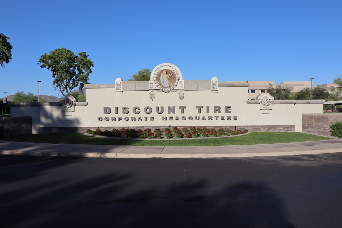 Entrance sign for Discount Tire's corporate headquarters campus in north Scottsdale, Arizona.