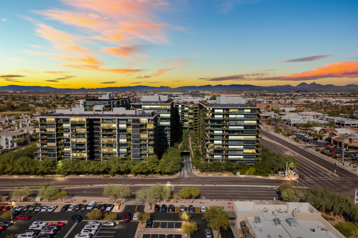 Aerial view of the Kierland Scottsdale luxury mixed-use development with upscale residences, retail, restaurants, and mountain views in North Scottsdale.