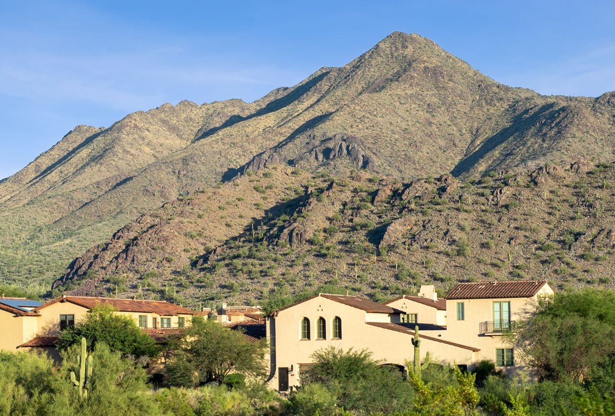 A photo of luxury homes beneath the McDowell Mountains.