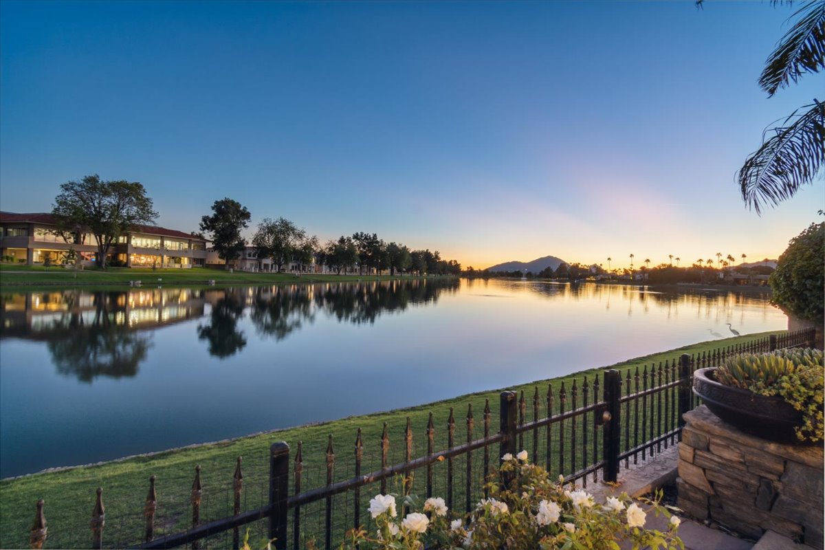 Sunset view over McCormick Ranch with waterfront homes and golf course surroundings.