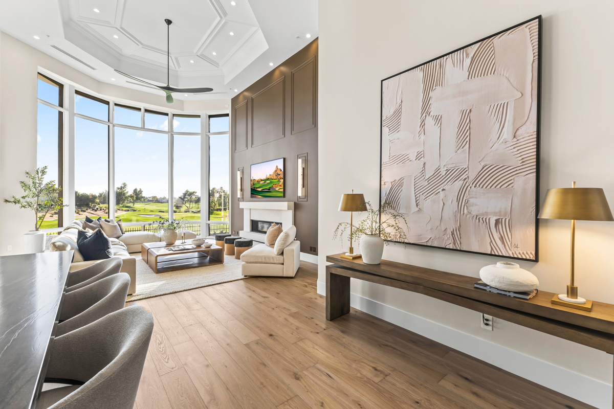 An elegant luxury living room overlooking an Arizona golf course.