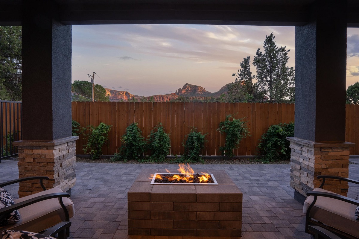 Arizona backyard fire pit with red rock mountain views.