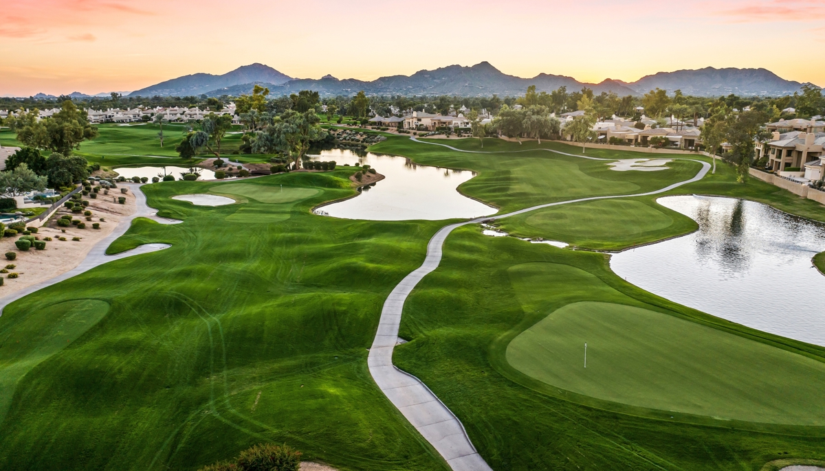 Golf course, lakes, luxury homes, and mountain views at Gainey Ranch in Scottsdale.