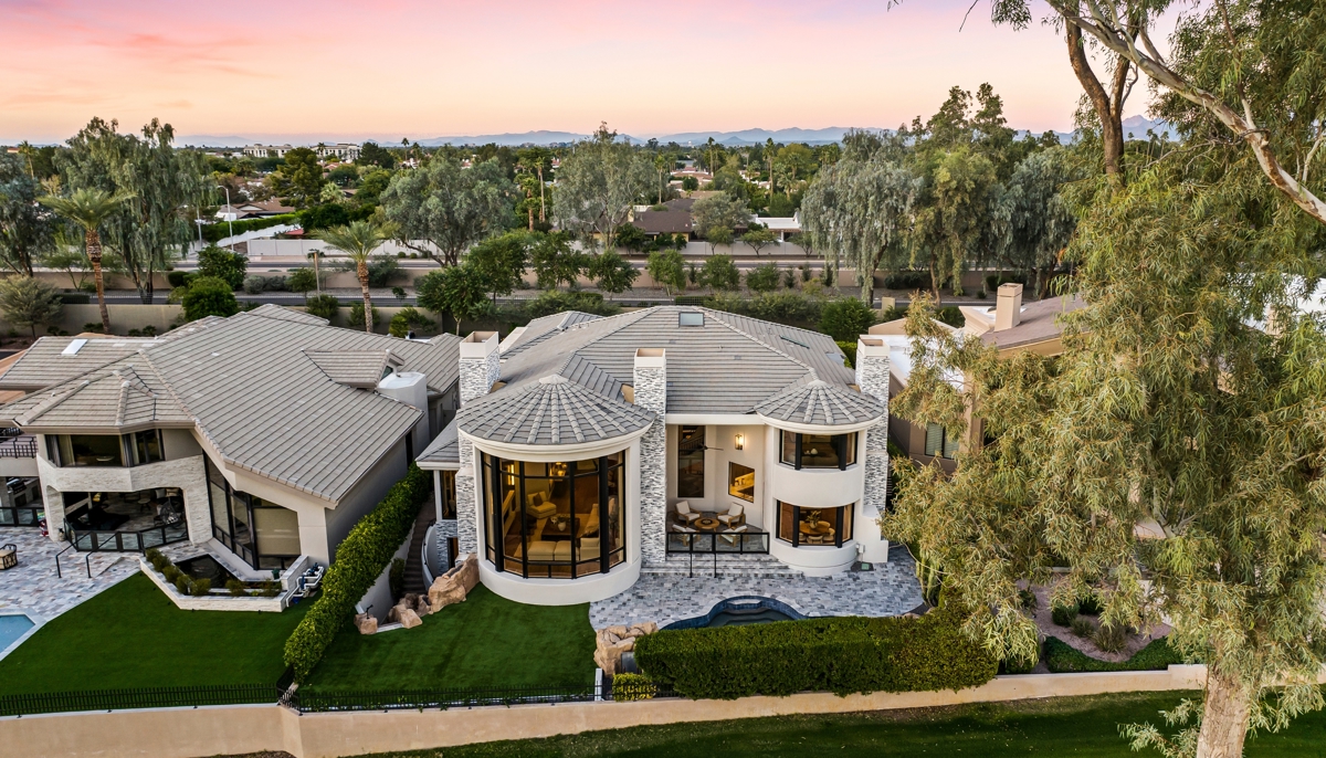 Luxury golf course home with mature landscaping in Gainey Ranch, Scottsdale.