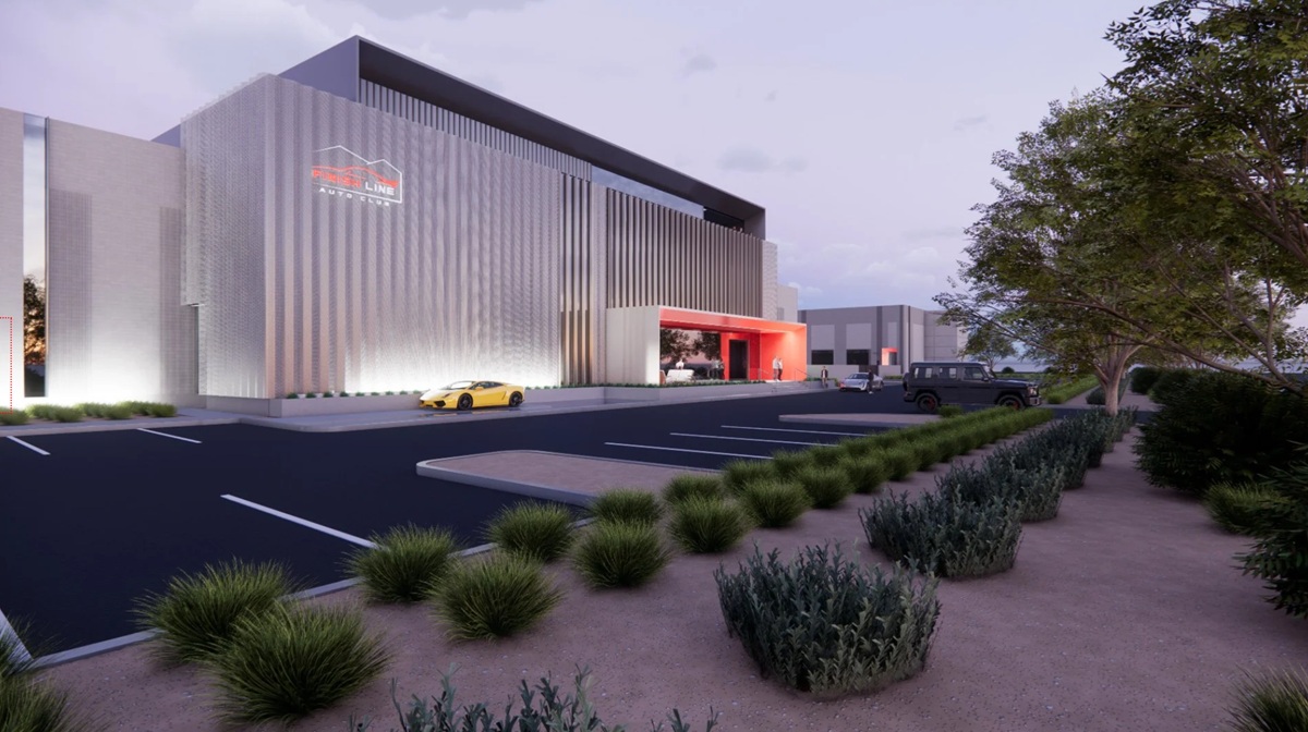 Finish Line Auto Club Scottsdale rendering with modern architecture, luxury cars, & desert landscaping.