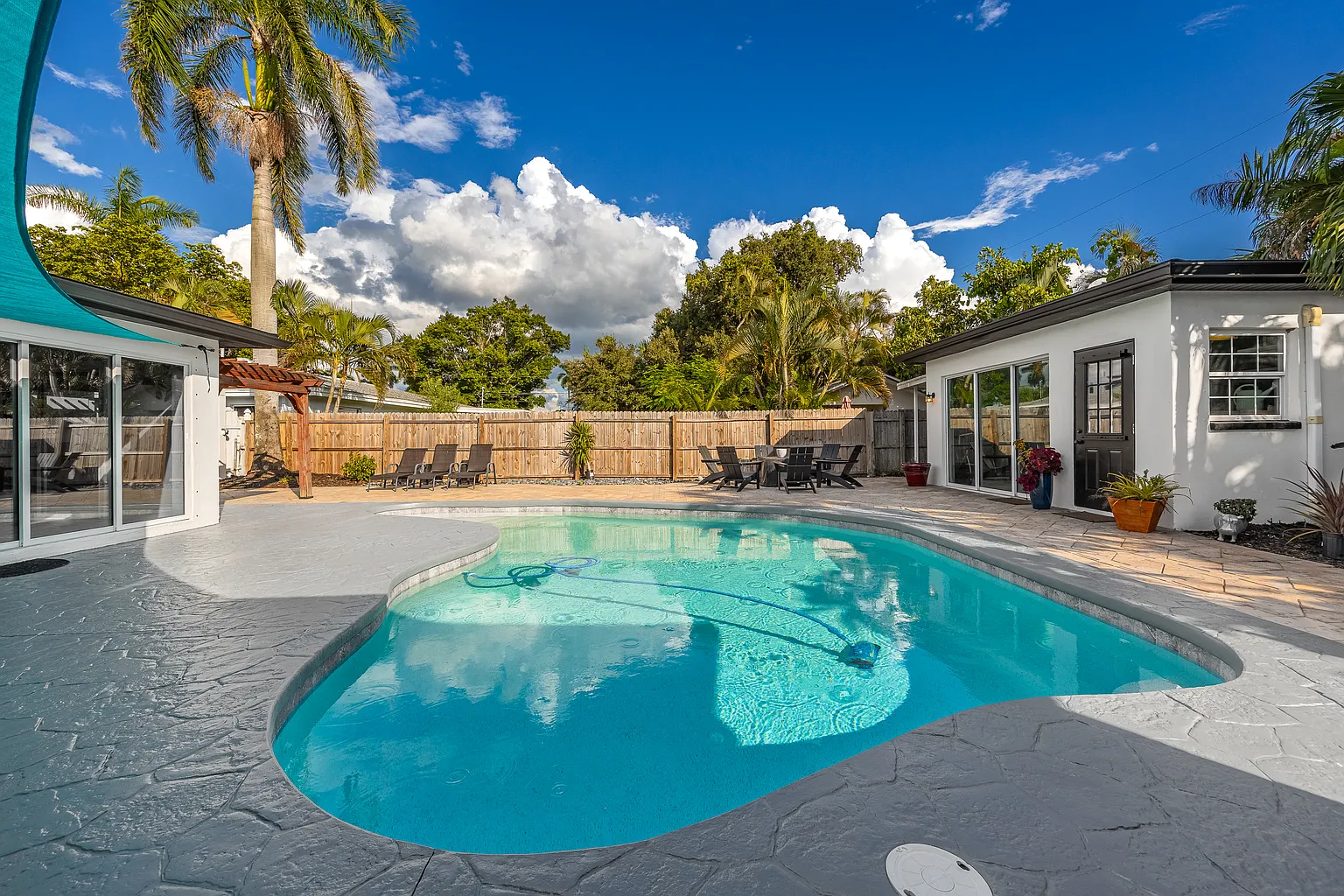 Florida Multigenerational Home with Detached Guest House Florida resale home with detached guest house and pool
