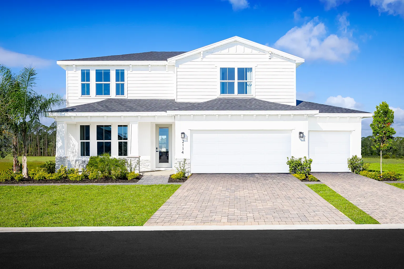New Construction Multigenerational Home Florida New construction multigenerational home Florida white exterior