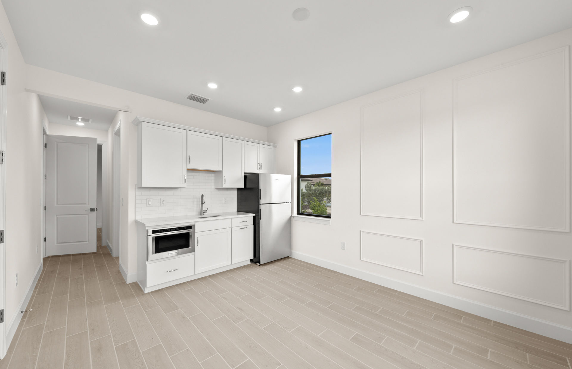 New Construction In-Law Suite Kitchen Florida New construction multigenerational suite kitchen and living area Florida